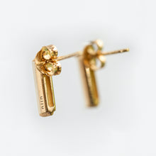 Load image into Gallery viewer, Back of gold stud earrings on a white background
